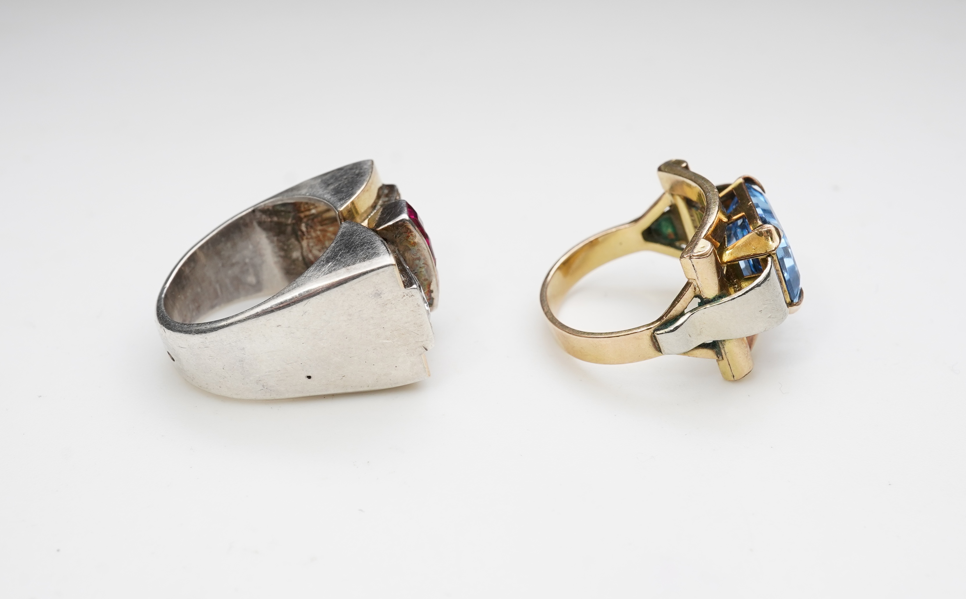 Two Retro synthetic stone and paste cocktail rings, 1940s
